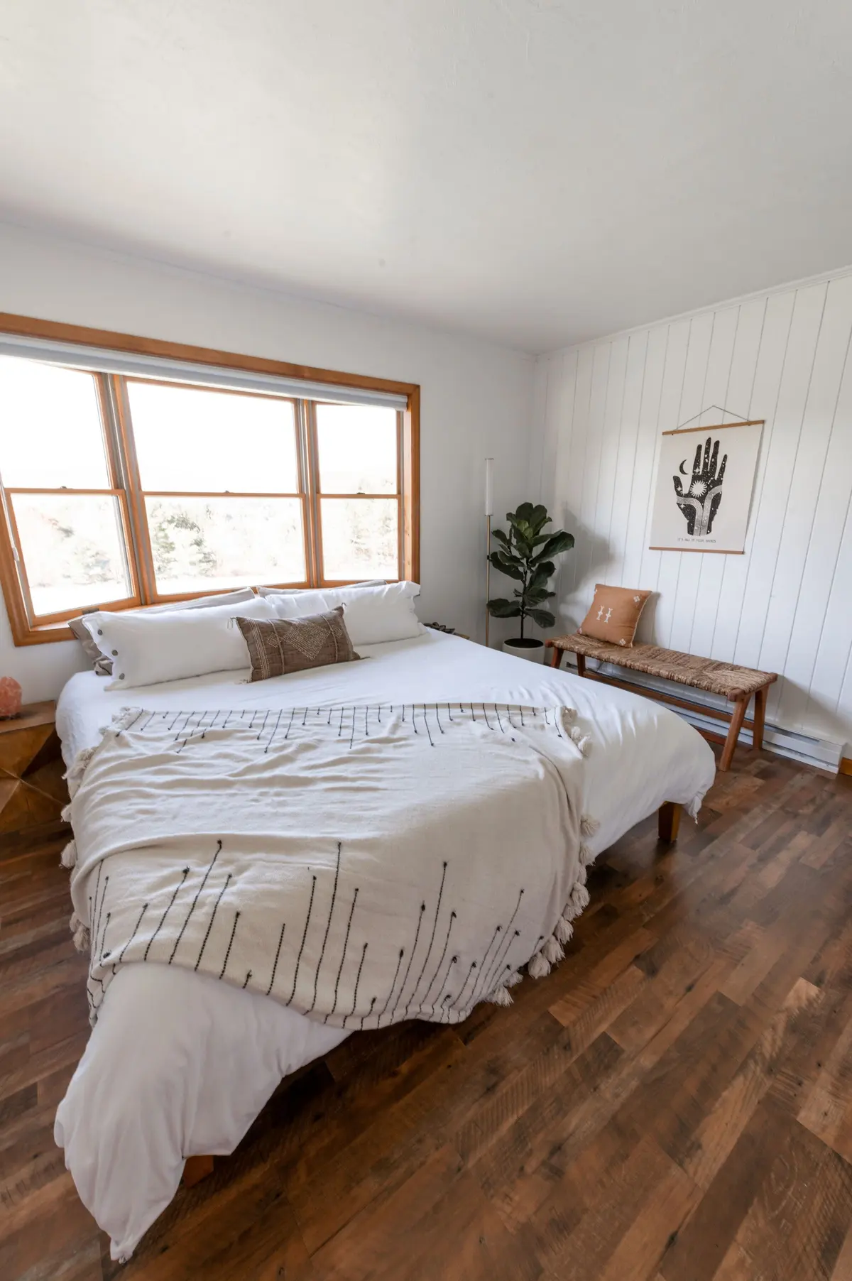 Bright laminate flooring in a bedroom