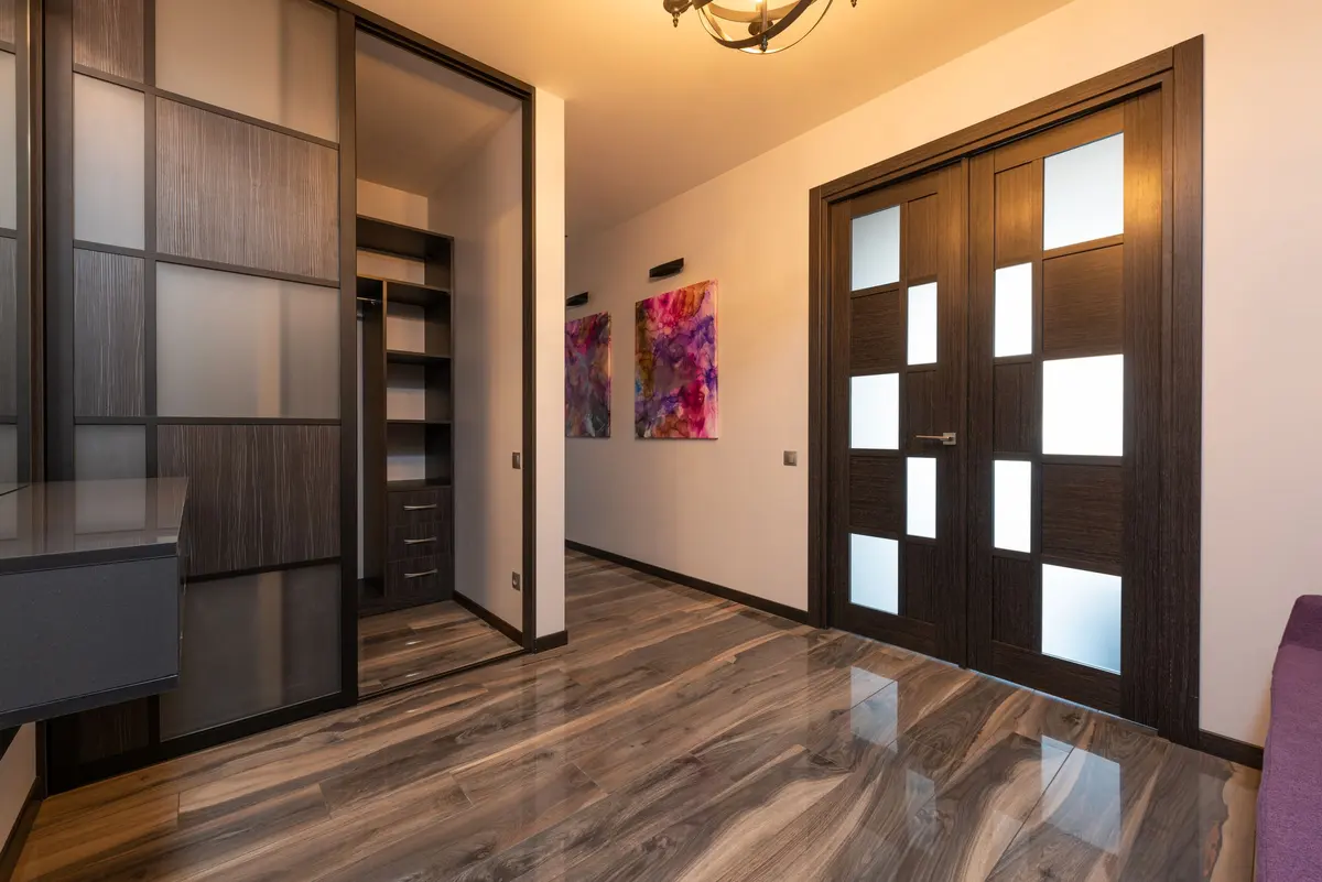 Contemporary laminate flooring in a closet