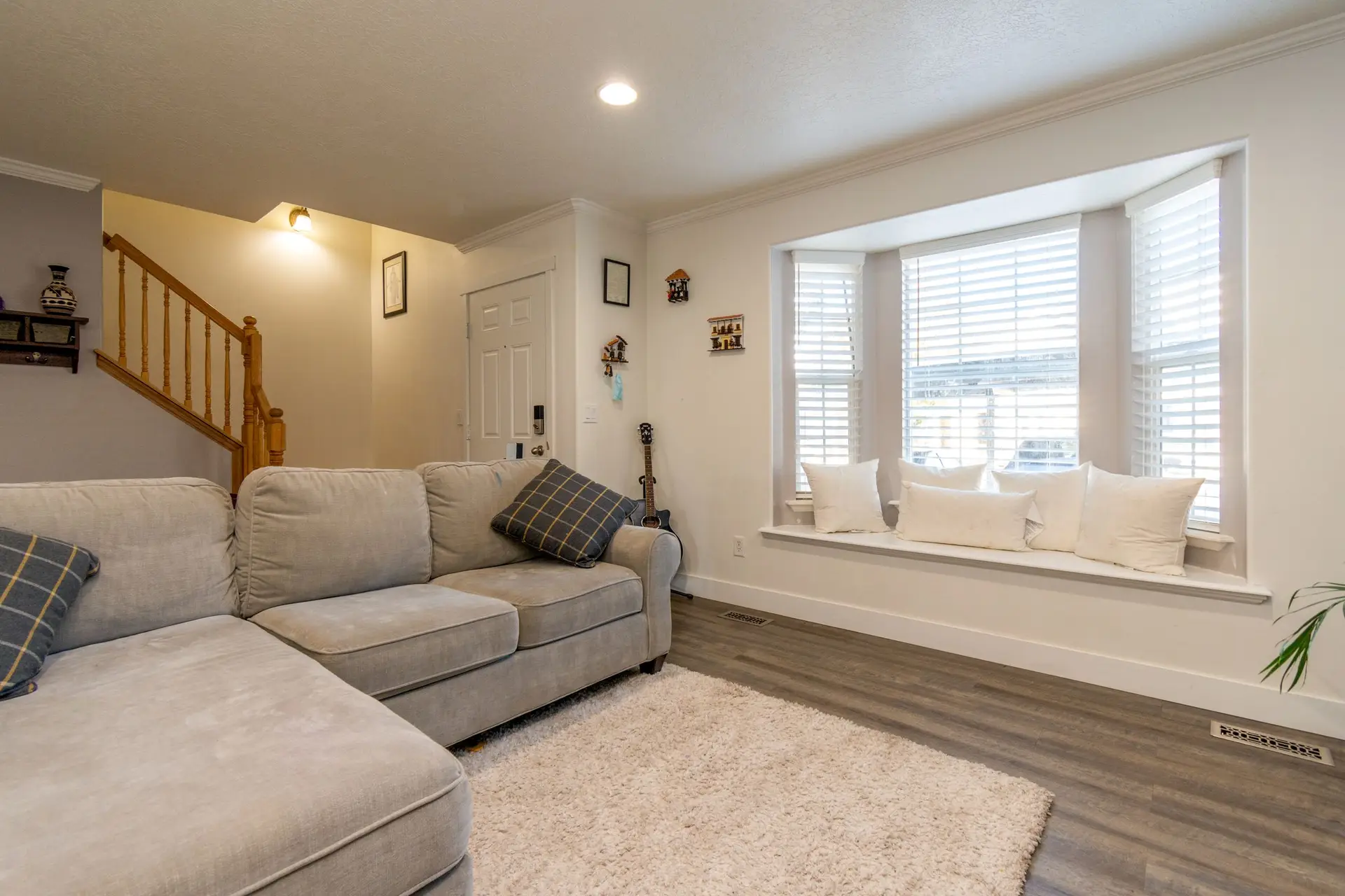 Bright luxury vinyl plank flooring in a living room