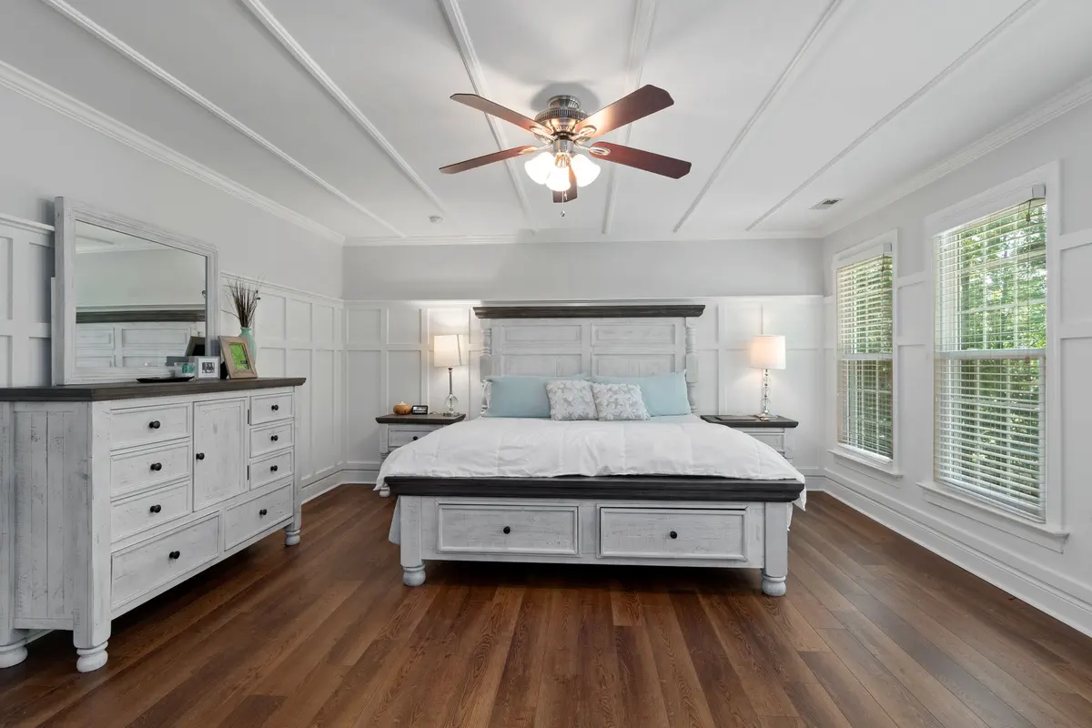 Cozy luxury vinyl plank flooring in a bedroom