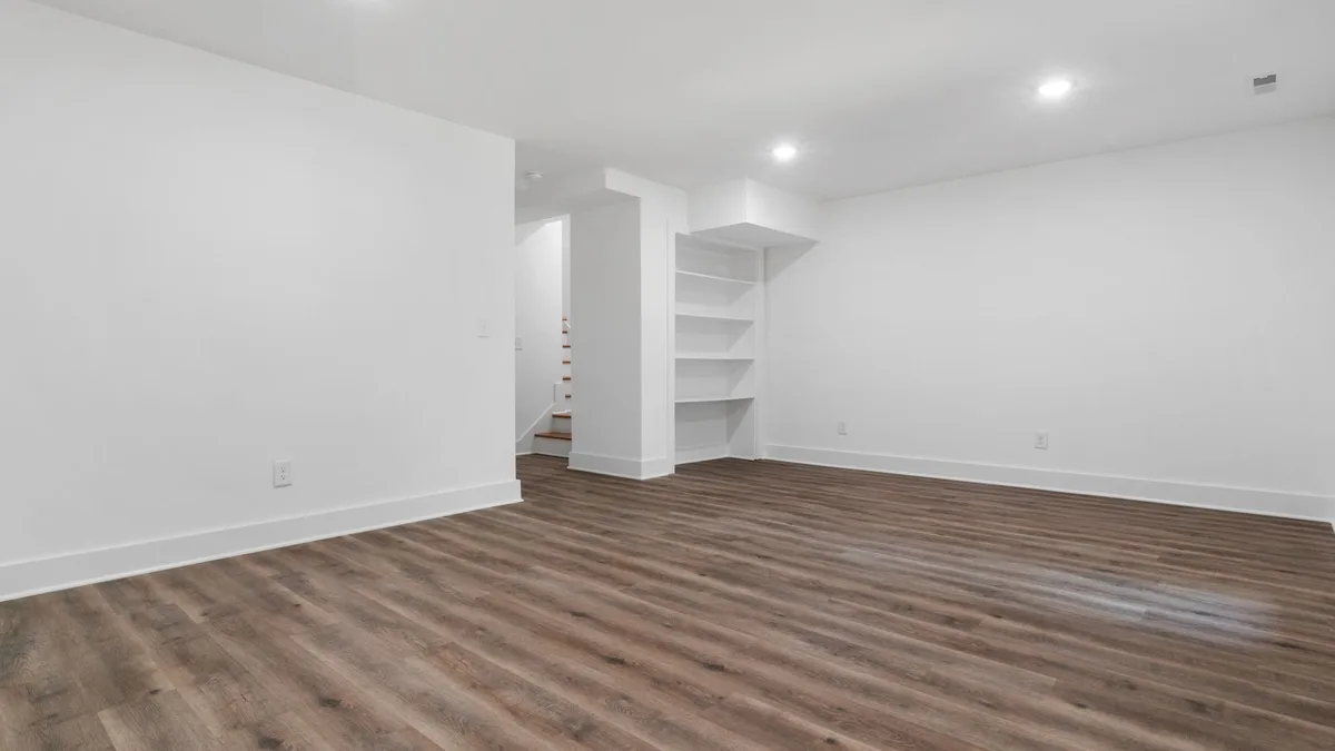 Durable plank flooring in a bright, open family room