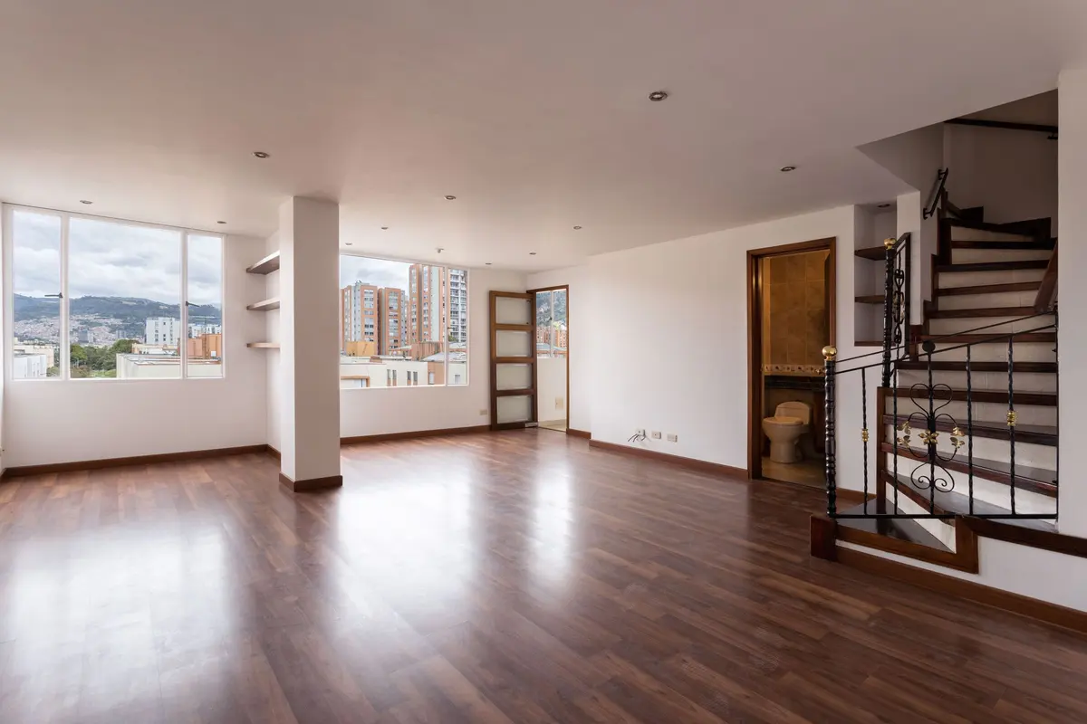 Bright stair treads and trim in a living room